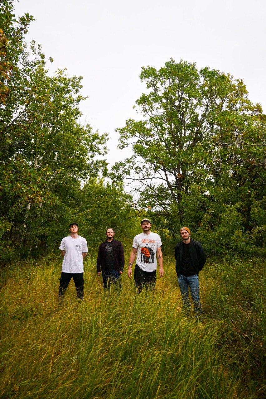 Studio picture of Bland, showcasing the band in a recording environment